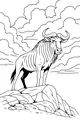 Free Wildebeest Coloring Page - Gnu on Rocky Hill Under Cloudy Sky (Printable PDF)